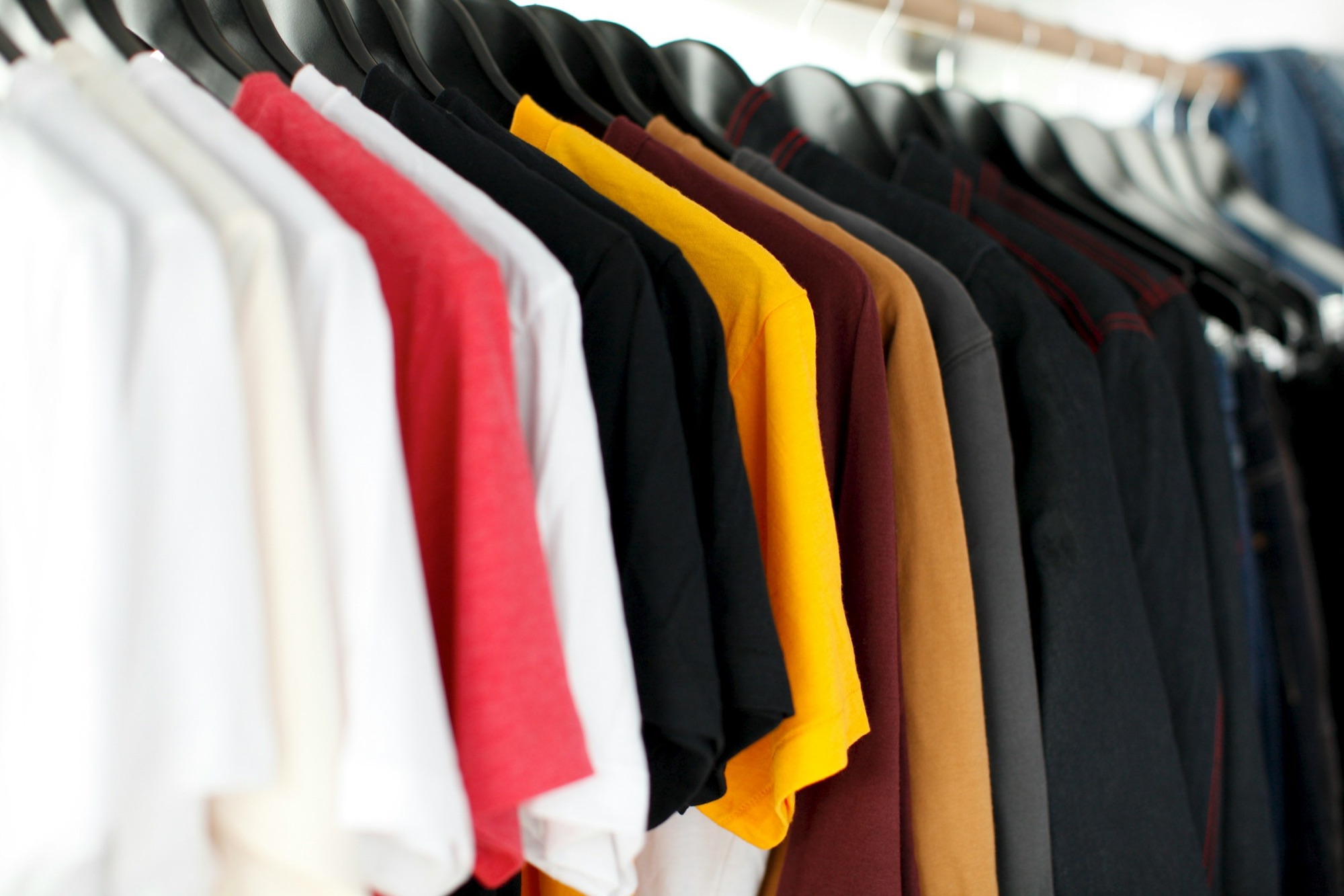 Interior of Threadwell Consignment showing curated clothing racks
